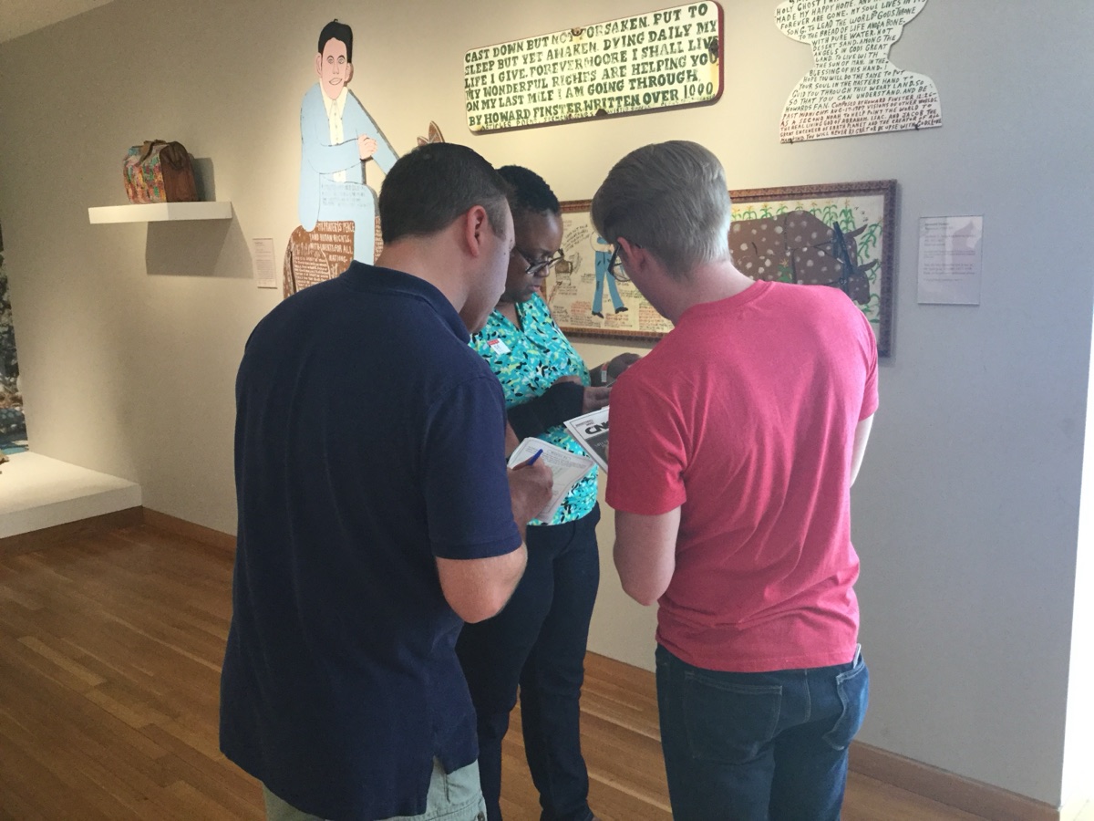 Team solving clues inside an Atlanta museum