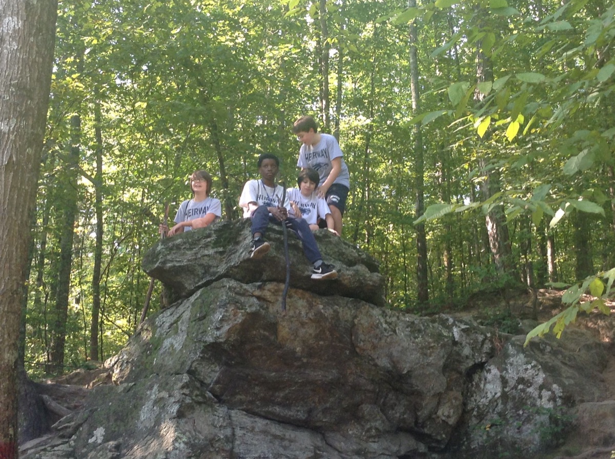 Kids on a boulder in the north Georgia woods